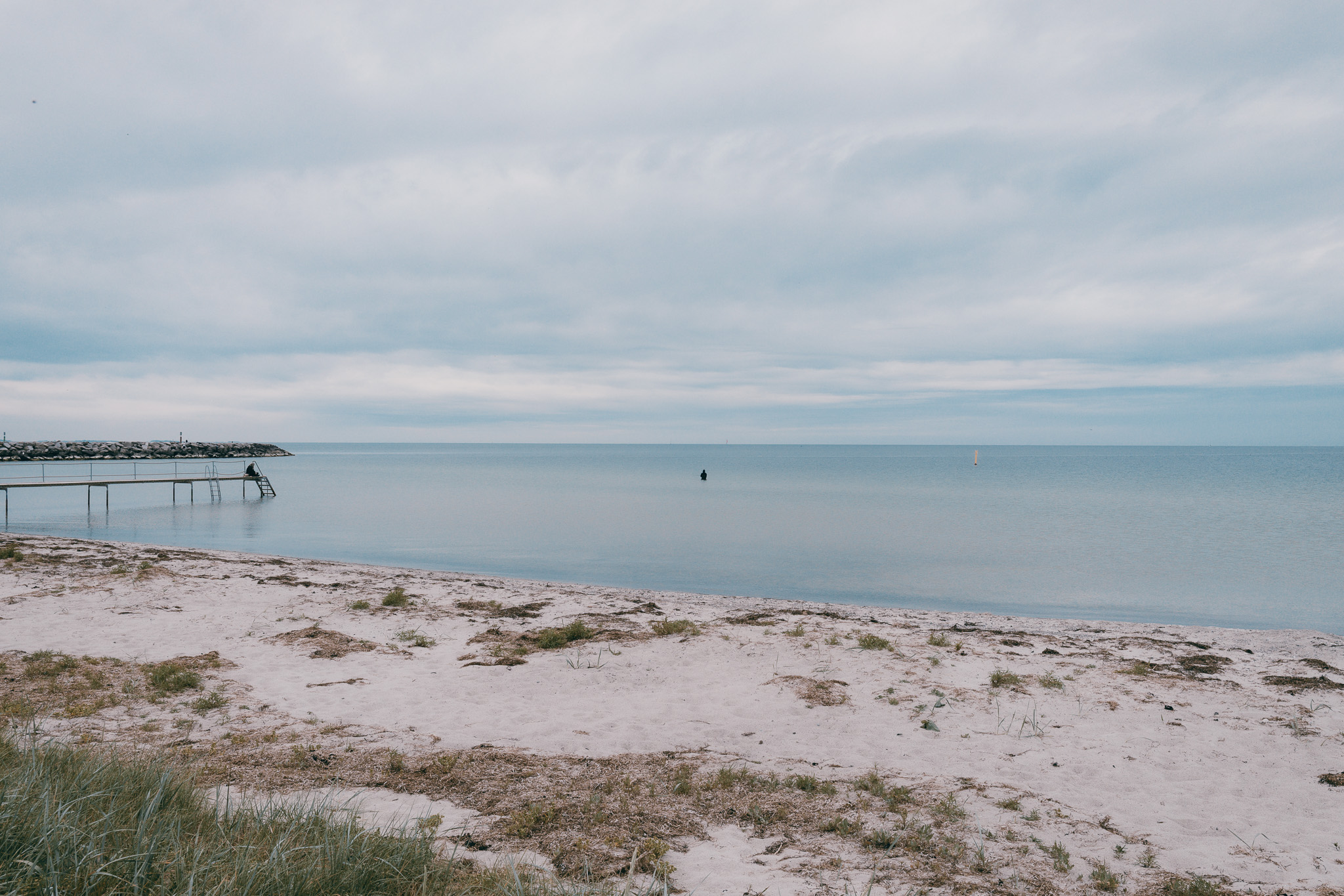 Serene beach landscape with calm waters